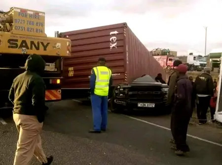 Kenyan woman watched as truck crushed car on busy Kenyan road killing businessman Kasyoki